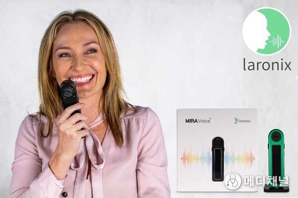 Patient Using Laronix MIRA Voice Device