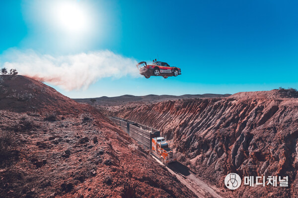 Travis Pastrana jumps over 160 foot canyon gap.