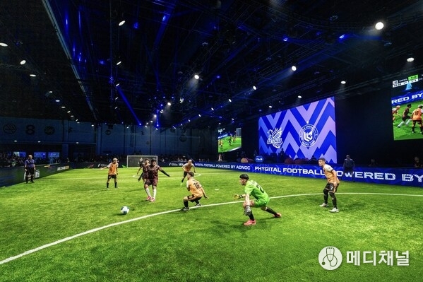 Phygital athletes competing in the physical side of Phygital Football